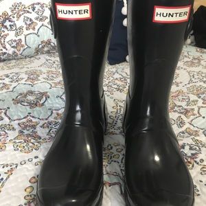 Black, short Hunter brand boots. Size 7.